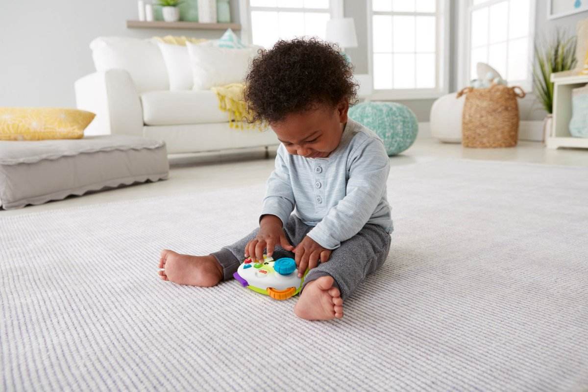 FISHER PRICE CONTROLLER INTERACTIV IN LIMBA ROMANA - Atelieru' lui Mesterica