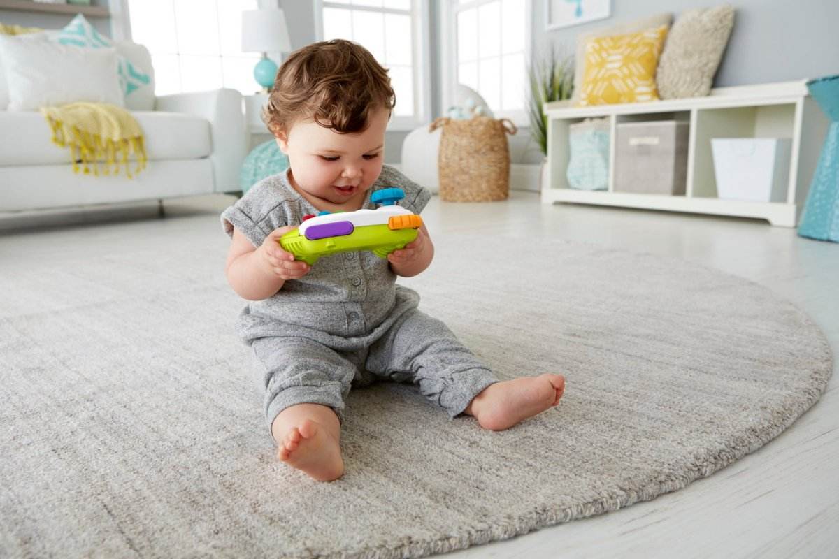 FISHER PRICE CONTROLLER INTERACTIV IN LIMBA ROMANA - Atelieru' lui Mesterica