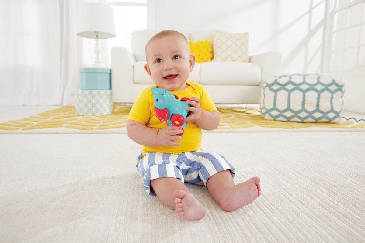 FISHER PRICE JUCARIE APASA SI MERGI ELEFANT - Atelieru' lui Mesterica
