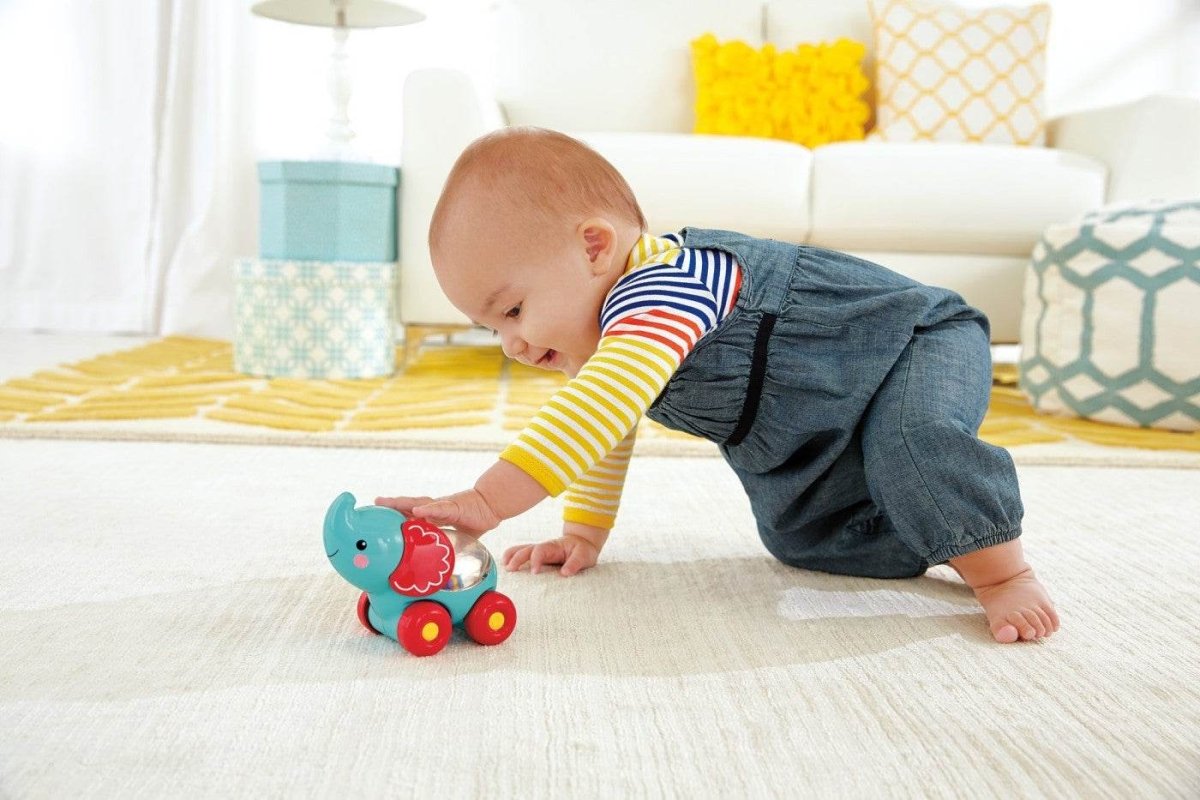 FISHER PRICE JUCARIE APASA SI MERGI ELEFANT - Atelieru' lui Mesterica