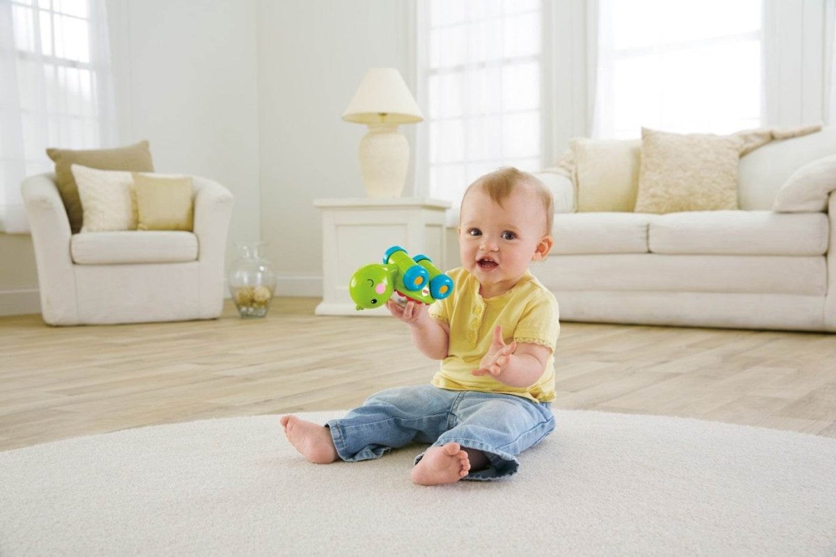 FISHER PRICE JUCARIE APASA SI MERGI TESTOASA Atelieru' lui Mesterica | Jucarii, haine si incaltaminte pentru copii