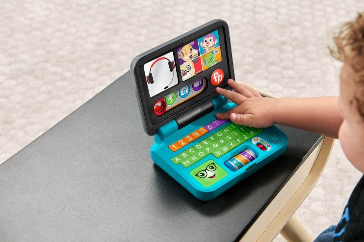 FISHER PRICE LAUGH&LEARN LAPTOP INTERACTIV IN LIMBA ROMANA Atelieru' lui Mesterica | Jucarii, haine si incaltaminte pentru copii