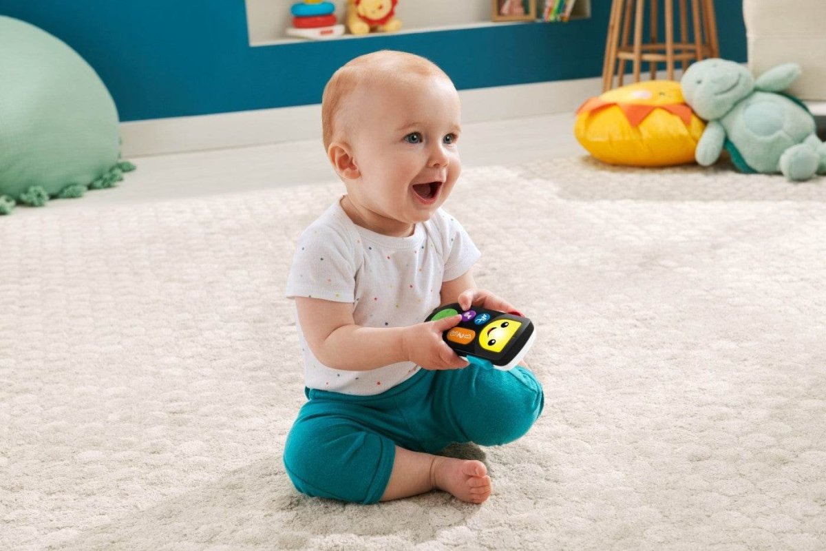 FISHER PRICE LAUGH&LEARN TELECOMANDA INTERACTIVA IN LIMBA ROMANA - Atelieru' lui Mesterica